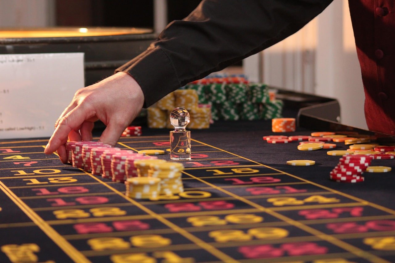 Filipino player browsing qqjili casino games on a mobile phone